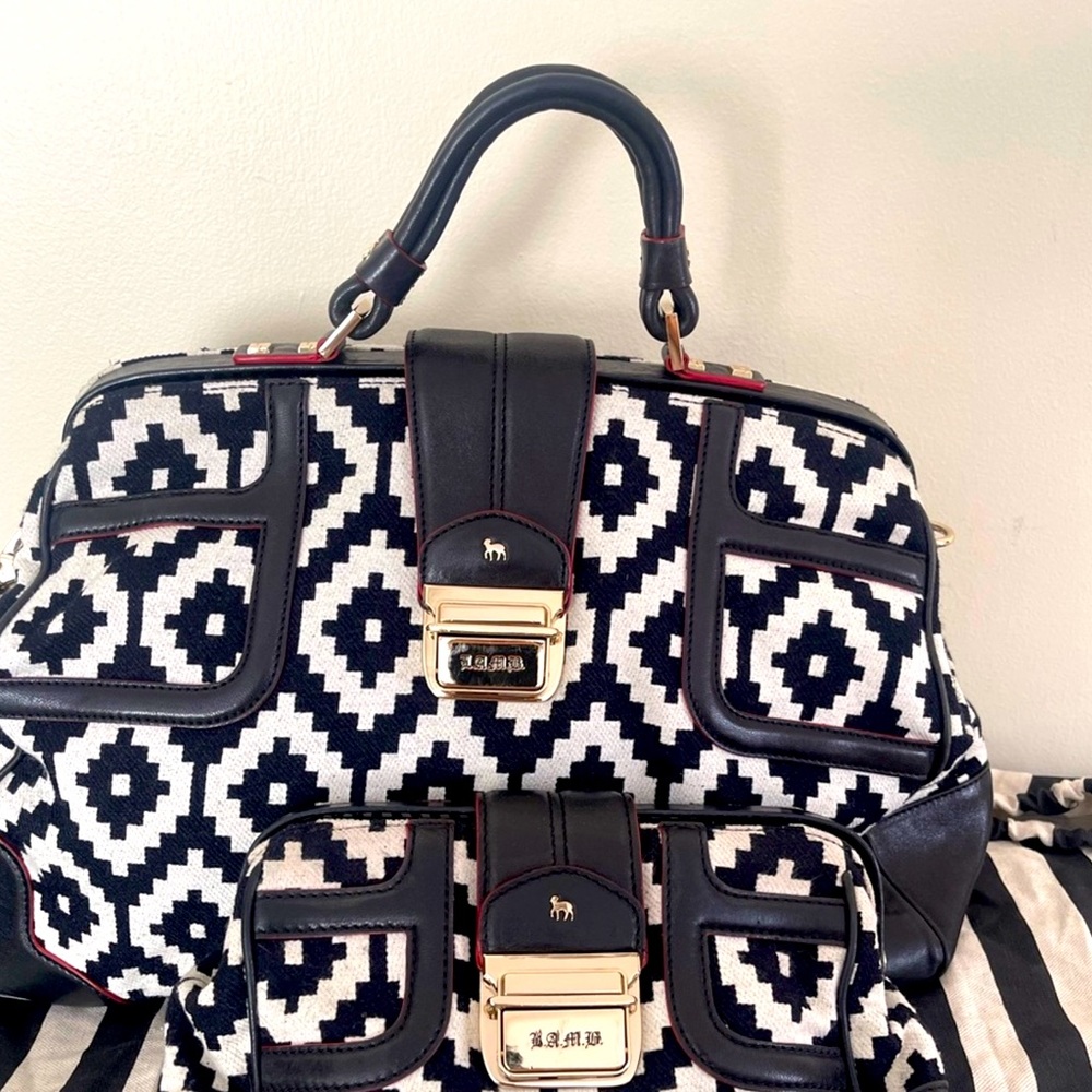 L.A.M.B. Carpet handbag and clutch set by Gwen Stefani